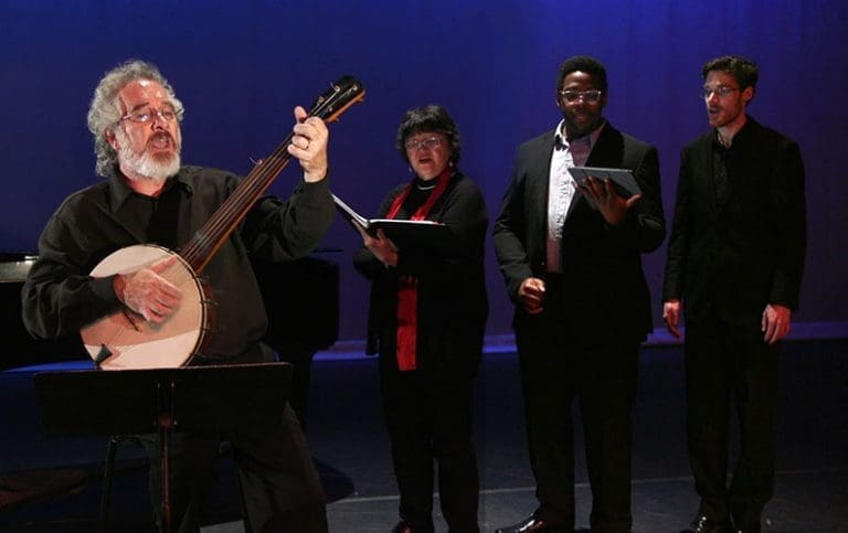 Glenn with Singers for adirondack folk opera singing on stage